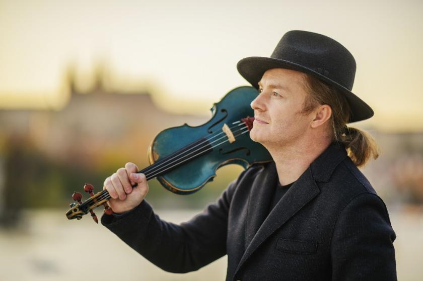 Pavel Šporcl with his blue violin in Prague
