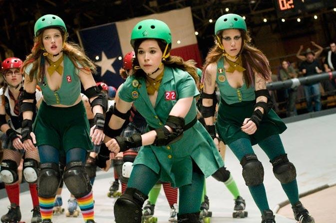 Ellen Page flanked by Drew Barrymore (left) and Kirsten Wiig in Barrymore's 'Whip It'