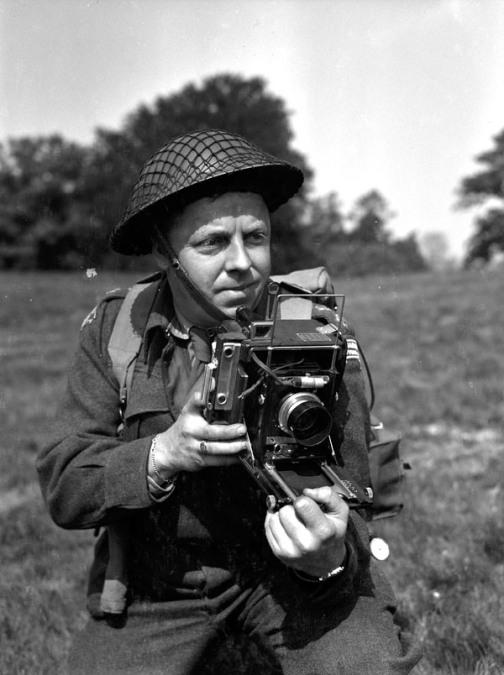 'Shooting the War': Tommy lays down his gun to get a good shot