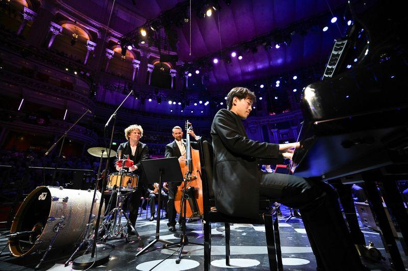 Santtu-Matias Rouvali on drum set, Tim Gibbs on bass and Bruce Liu in Joplin's Maple Leaf Rag