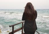 Alleged rape victim 'Emily' on the seafront in Cyprus