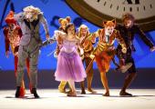 The Royal Ballet's new Alice: A design-led production surrounded as copiously by flying cheques as Alice is surrounded by flying playing cards