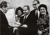 'A great great friend': Lilian and Victor Hochhauser flank the great violinist David Oistrakh, as he receives the French Academy Golden Disc