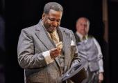 Willy Loman (Wendell Pierce) once again receives a bailout from neighbour Charley (Trevor Cooper)