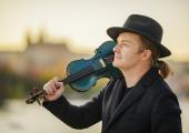 Pavel Šporcl with his blue violin in Prague