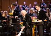 The great Gennady Rozhdestvensky receives Russian roses while Ian Bostridge and Iestyn Davies look on