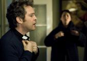 'It's like you've got no cock': Tom Hollander as Rev. Adam Smallbone applies his dog collar