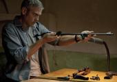 George Clooney as Jack in 'The American'; 'More brutal than Bond'