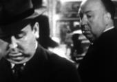 Shadow of a doubt: Alfred Hitchcock is disconcerted by a glimpse of a strangely familiar face