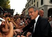'You've got great hair': George and the jungle at the 68th Venice Film Festival