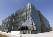 The new Jewish Museum's masculine and metallic exterior faces the monument ot the Ghetto Heroes