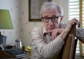 Woody Allen at his writing desk in his bedroom