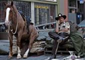Andrew Lincoln (right) as Rick Grimes with his faithful horse, Blade