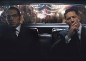 Doing the villains in different voices: Tom Hardy as Ronnie and Reggie Kray