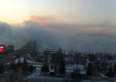 Bridge over the river Yenisei: In minus 26 degrees the river gushes steam