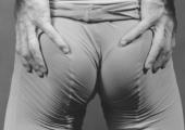 Peter Reed, clenching his buttocks, by Robert Mapplethorpe