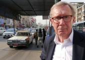 Peter Taylor at an Iraqi Police vehicle checkpoint, Baghdad