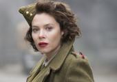 Anna Friel and a gravity defying hat try to stop the Nazis