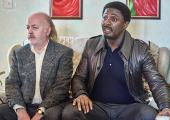 Bagpipes (Bill Bailey) and Walter (Idris Elba)