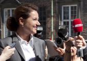 Birgitte Nyborg (Sidse Babett Knudsen) flashes trademark smile for the media