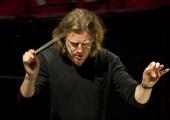 Baton in hand: Belgian conductor Koen Kessels