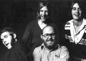 Chiswick Records’ Ted Carroll (with beard) with The Gorillas in 1976. Lead Gorilla Jesse Hector at left