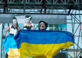Some of Ukraine's seven-piece Dakh Daughters fly the flag