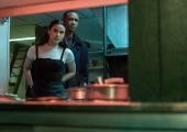 Dumb waiter? Katie (Camila Mendes) and Adam (Jessie T Usher)