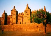 Morning breaks over the Djenne mosque in Mali