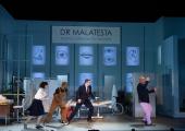 Norina (Kelli-Ann Masterson), Ernesto (Patrick Kabongo) and Malatesta (Ben McAteer) corner Don Pasquale (Graeme Danby)