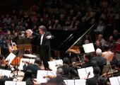 Battling the acoustic: Gustavo Dudamel conducts the Simon Bolivar Symphony Orchestra