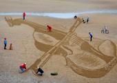 A five-stringed fiddle for a left-hander on Elie beach, courtesy of Sand in Your Eye