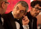 MI7's master spy Johnny English practises his poker face