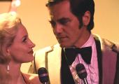 Tammy Wynette (Jessica Chastain) stands by George Jones (Michael Shannon)