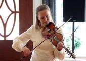 Anne Hytta at Hardanger Musikkfest, with her Hardanger Fiddle – made in 1860