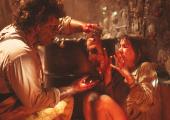 Beauty and the beast: lovestruck Leatherface (Bill Johnson) bonds with Stretch (Caroline Williams)