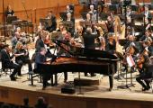 Fitting choice: Sir Stephen Hough performing his own new concerto with Sir Mark Elder and the Hallé