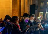 Vladimir Jurowski (in the hat), fellow musicians and Polish musicologist Paulina Miu (holding microphone) sing a folksong from Eastern Ukraine at Berlin's Brandenburg Gate last Friday