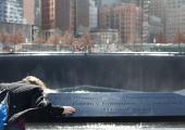 Reflecting absence: 'where the Twin Towers once rose into the clouds, now the ground swallows up their footprints'