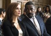 Defence strategy: Molly Bloom (Jessica Chastain) in court with Charlie Jaffey (Idris Elba)