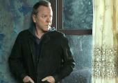 Paranoid, moi? Kiefer Sutherland as John Weir