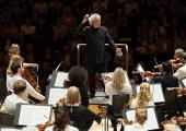 Sir Simon Rattle directing Guildhall School and London Symphony musicians