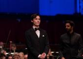 First Prize winner Jaeden Izik-Dzurko with Domingo Hindoyan and the Royal Liverpool Philharmonic Orchestra