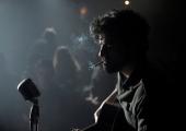 Poor boy: Llewyn (Oscar Isaac) performs 'Hang Me, Oh Hang Me' at the Gaslight Café in Greenwich Village