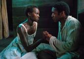 Not to survive but to live: Lupita Nyong'o, Best Supporting Actress nominee, with Best Actor Nominee Chiwetel Ejiofor in '12 Years A Slave'