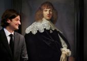 Jan Six XI with his newly discovered 'Portrait of a Young Gentleman'