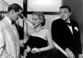 Dan Duryea, June Vincent, and Peter Lorre ponder a talismanic brooch in 'Black Angel'