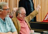 Sir David Pountney in rehearsal for 'Masque of Might' with Robin Tebbutt, assistant director, to his left