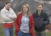 Sheridan Smith as Julie Bushby (centre), with Sîan Brooke as Natalie Brown (left) and Gemma Whelan as Karen Matthews