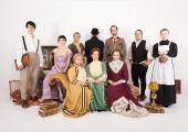 Rooming-house ruses: the cast of 'The Passing of the Third Floor Back' in their Edwardian finery